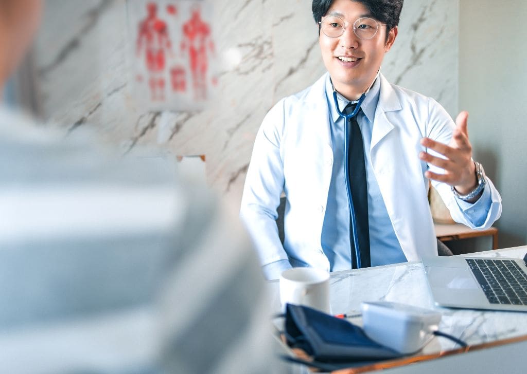 Doctor at a men's health clinic explaining the procedures of circumcision in Malaysia.
