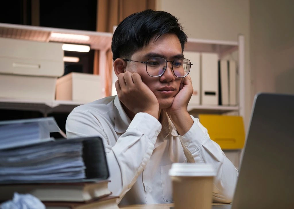 A depressed man experiencing mood swings due to low testosterone.