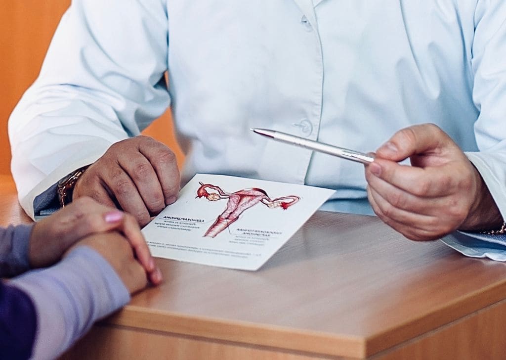 A patient consulting a health clinic to inquire about STD test price in Malaysia. 